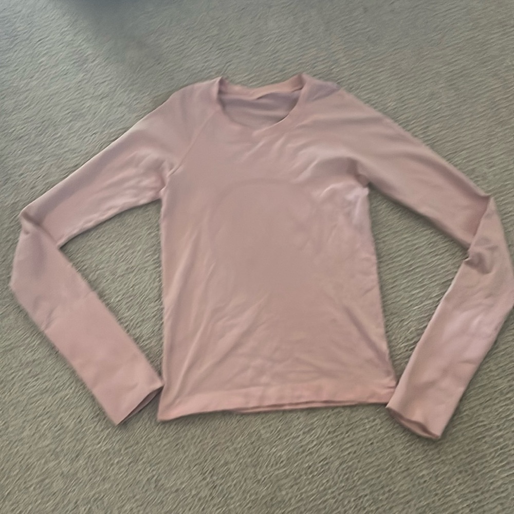 one time used, long sleeve, light pink lululemon, swiftly tech